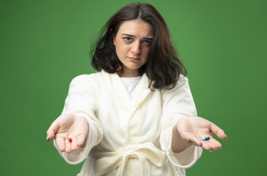 What is Hormonal Imbalance? How Functional Medicine Can Cure it? 3 girl holding medicine